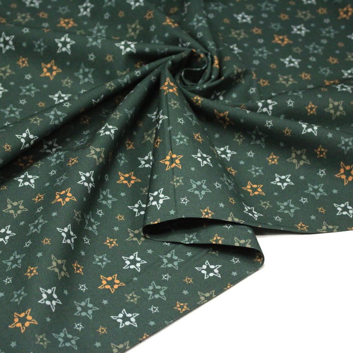 Tissu cotonnade vert aux notes de musique en étoiles - STANDARD 100 OEKO - TEX - TissusPapi.com
