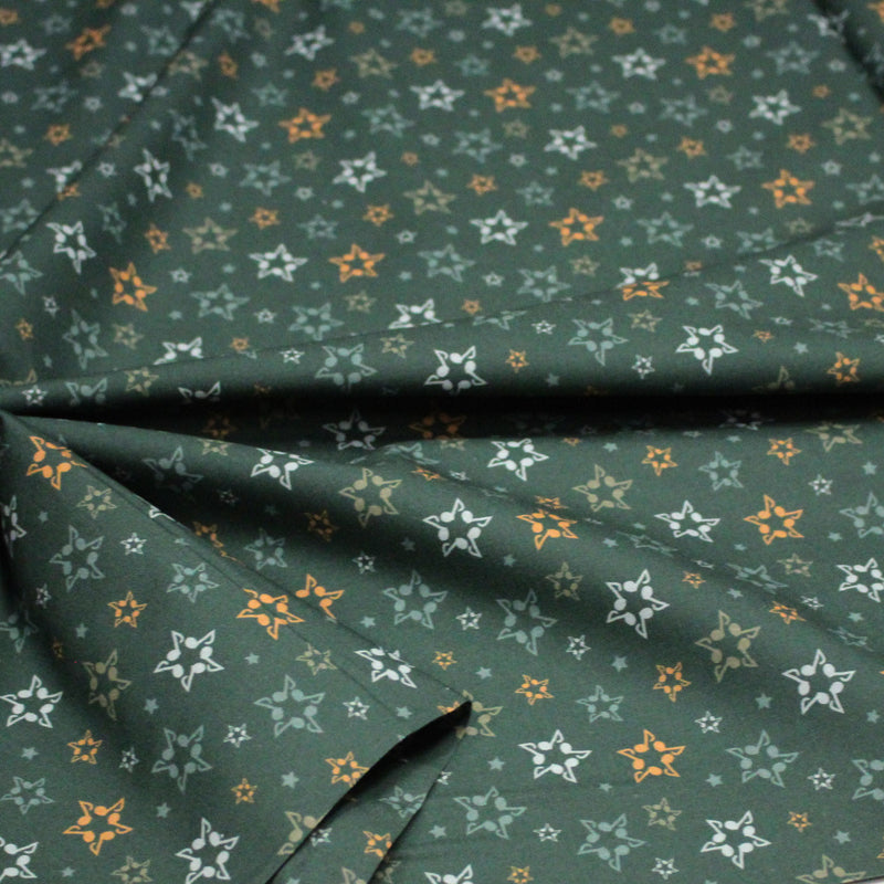 Tissu cotonnade vert aux notes de musique en étoiles - STANDARD 100 OEKO - TEX - TissusPapi.com
