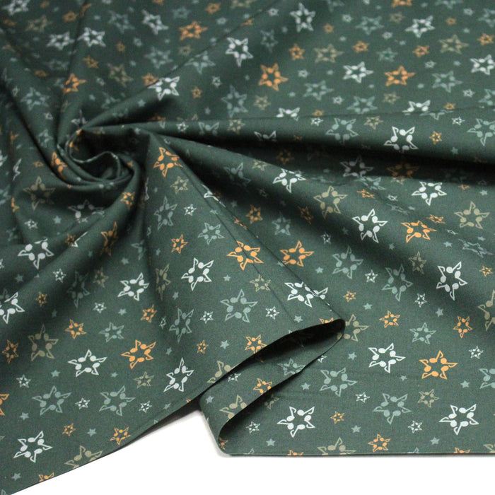 Tissu cotonnade vert aux notes de musique en étoiles - STANDARD 100 OEKO - TEX - TissusPapi.com