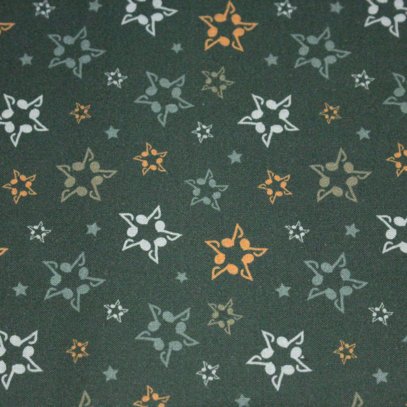 Tissu cotonnade vert aux notes de musique en étoiles - STANDARD 100 OEKO - TEX - TissusPapi.com
