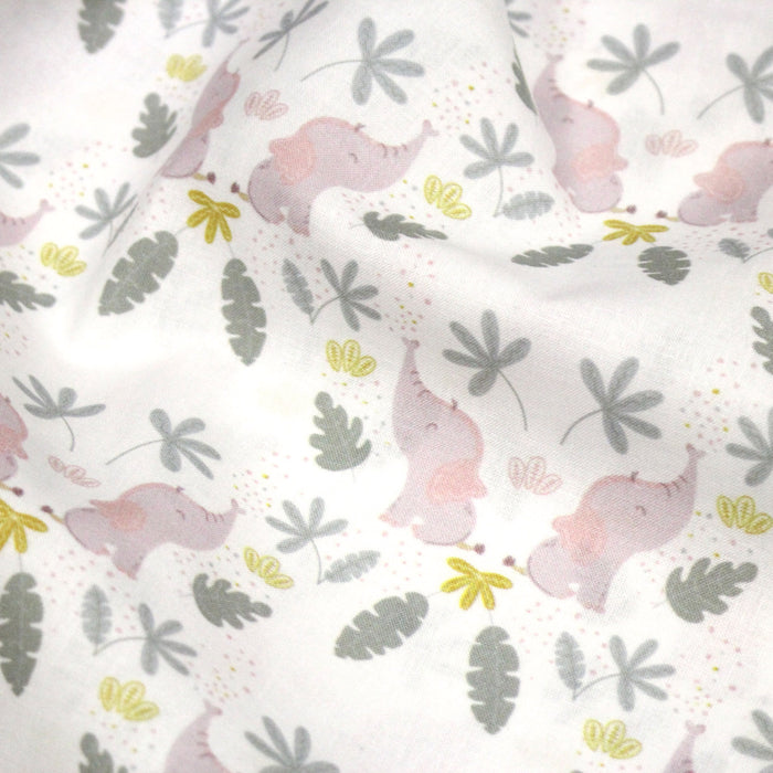 Tissu cotonnade enfant blanc aux éléphants & feuilles tropicales - STANDARD 100 OEKO - TEX - TissusPapi.com