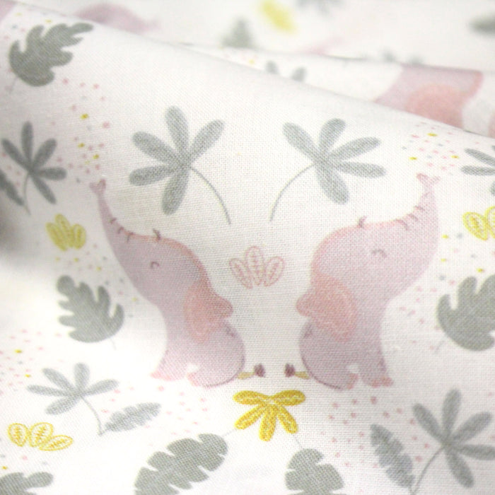 Tissu cotonnade enfant blanc aux éléphants & feuilles tropicales - STANDARD 100 OEKO - TEX - TissusPapi.com