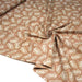 Tissu cotonnade caramel aux feuilles tropicales - STANDARD 100 OEKO - TEX - TissusPapi.com