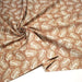 Tissu cotonnade caramel aux feuilles tropicales - STANDARD 100 OEKO - TEX - TissusPapi.com