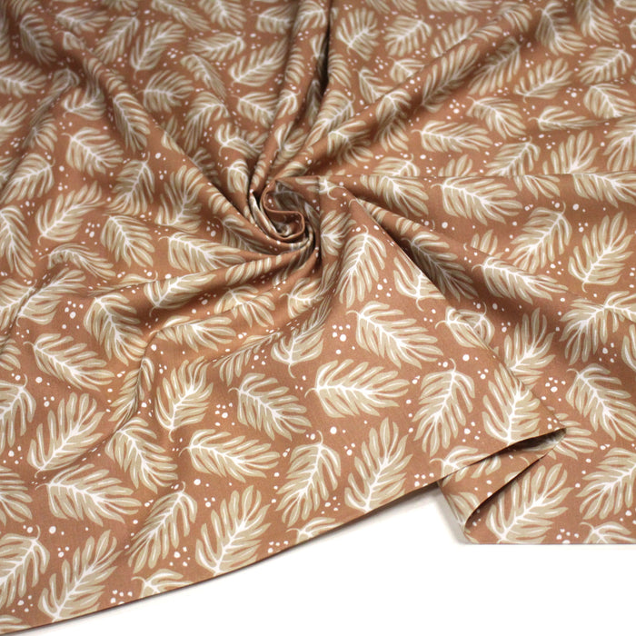 Tissu cotonnade caramel aux feuilles tropicales - STANDARD 100 OEKO - TEX - TissusPapi.com