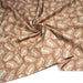 Tissu cotonnade caramel aux feuilles tropicales - STANDARD 100 OEKO - TEX - TissusPapi.com
