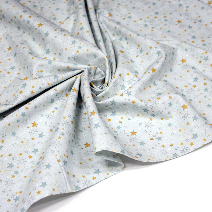 Tissu cotonnade bleu ciel aux étoiles bleues et jaunes - STANDARD 100 OEKO - TEX - TissusPapi.com