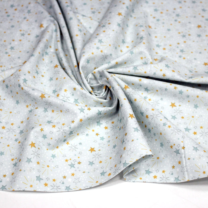 Tissu cotonnade bleu ciel aux étoiles bleues et jaunes - STANDARD 100 OEKO - TEX - TissusPapi.com