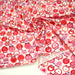 Tissu cotonnade POMME D'AMOUR, coeurs roses et pommes rouges - TissusPapi.com
