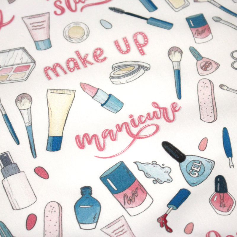 Tissu cotonnade MAKE - UP GIRLY, motifs maquillages et parfums, tons roses, bleus, écrus - TissusPapi.com