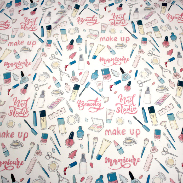 Tissu cotonnade MAKE - UP GIRLY, motifs maquillages et parfums, tons roses, bleus, écrus - TissusPapi.com
