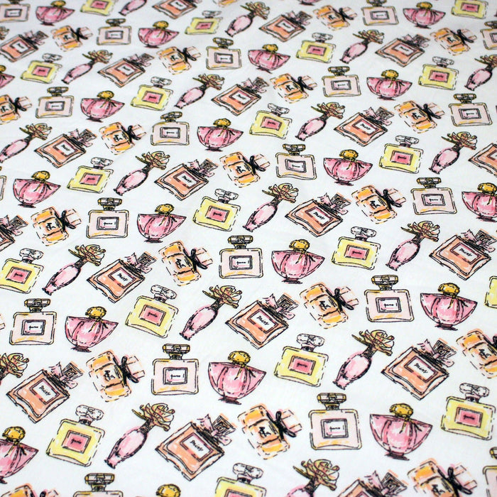 Tissu cotonnade MAKE - UP GIRLY, motifs bouteilles de parfum multicolores - TissusPapi.com