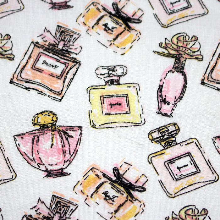 Tissu cotonnade MAKE - UP GIRLY, motifs bouteilles de parfum multicolores - TissusPapi.com