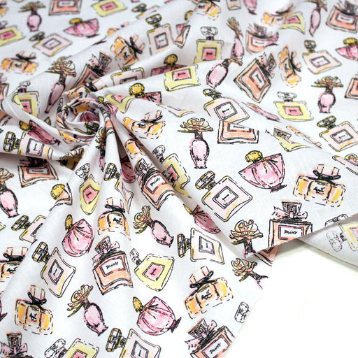 Tissu cotonnade MAKE - UP GIRLY, motifs bouteilles de parfum multicolores - TissusPapi.com