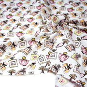 Tissu cotonnade MAKE - UP GIRLY, motifs bouteilles de parfum multicolores - TissusPapi.com