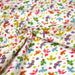 Tissu cotonnade blanc aux oiseaux multicolores - OEKO - TEX STANDARD 100 - TissusPapi.com