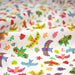 Tissu cotonnade blanc aux oiseaux multicolores - OEKO - TEX STANDARD 100 - TissusPapi.com
