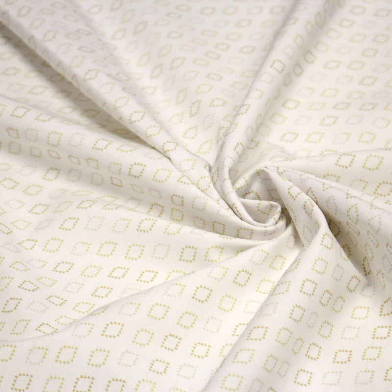 Tissu cotonnade enfant, les losanges en triangle ocres et écrus - OEKO - TEX STANDARD 100 - TissusPapi.com