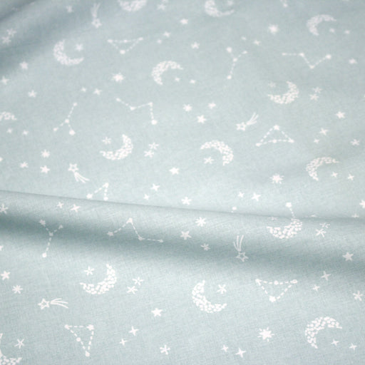 Tissu cotonnade enfant, constellation blanche, lune et étoiles fond vert clair - OEKO - TEX STANDARD 100 - TissusPapi.com