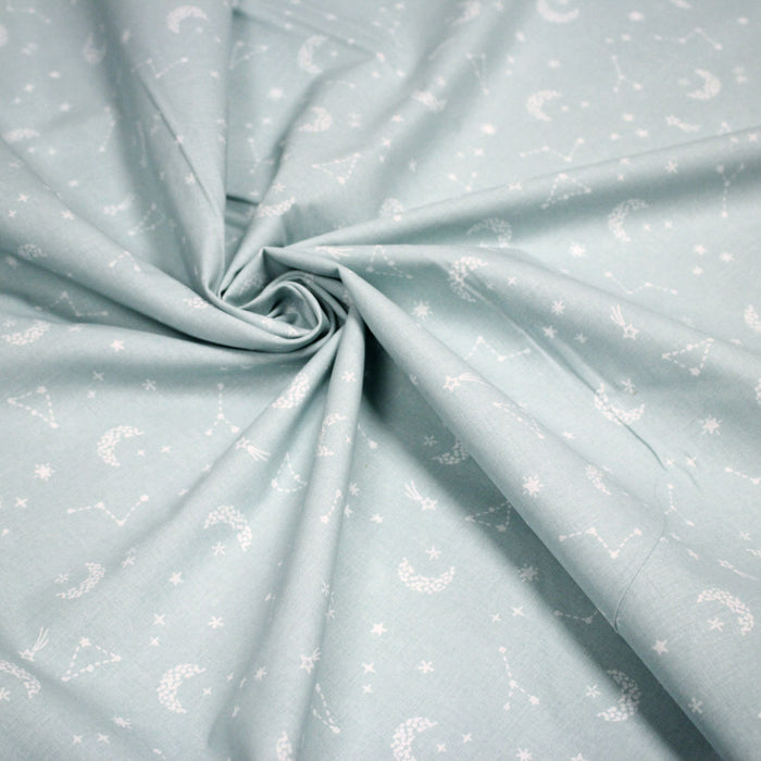 Tissu cotonnade enfant, constellation blanche, lune et étoiles fond vert clair - OEKO - TEX STANDARD 100 - TissusPapi.com
