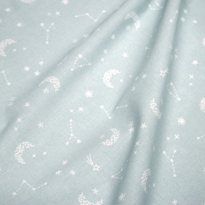 Tissu cotonnade enfant, constellation blanche, lune et étoiles fond vert clair - OEKO - TEX STANDARD 100 - TissusPapi.com