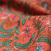 Tissu coton fin imprimé INDIENNES, corail aux fleurs roses et vertes - STANDARD 100 OEKO - TEX - TissusPapi.com