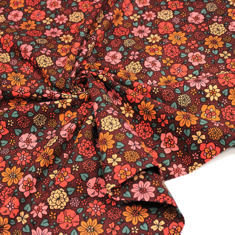 Tissu velours milleraies imprimé SEVENTIES choco aux fleurs rouge roses oranges - STANDARD 100 OEKO-TEX - TissusPapi.com
