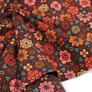 Tissu velours milleraies imprimé SEVENTIES choco aux fleurs rouge roses oranges - STANDARD 100 OEKO-TEX - TissusPapi.com