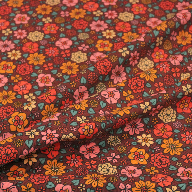 Tissu velours milleraies imprimé SEVENTIES choco aux fleurs rouge roses oranges - STANDARD 100 OEKO-TEX - TissusPapi.com