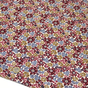 Tissu velours milleraies imprimé écru aux fleurs bordeaux, ocre, fleur pétrole - STANDARD 100 OEKO-TEX - TissusPapi.com
