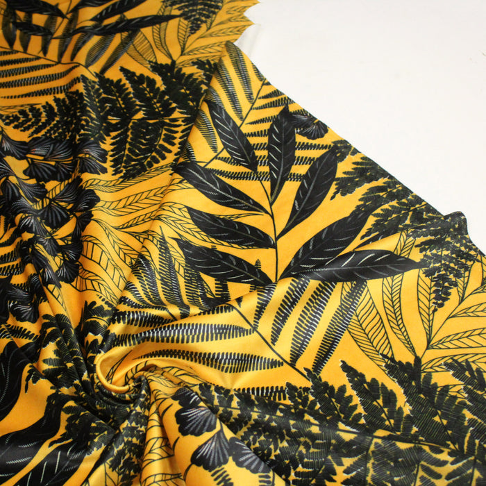 Tissu Velours ras motif tropical, tons jaunes et noirs