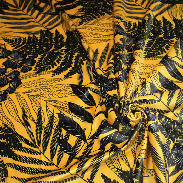 Tissu Velours ras motif tropical, tons jaunes et noirs