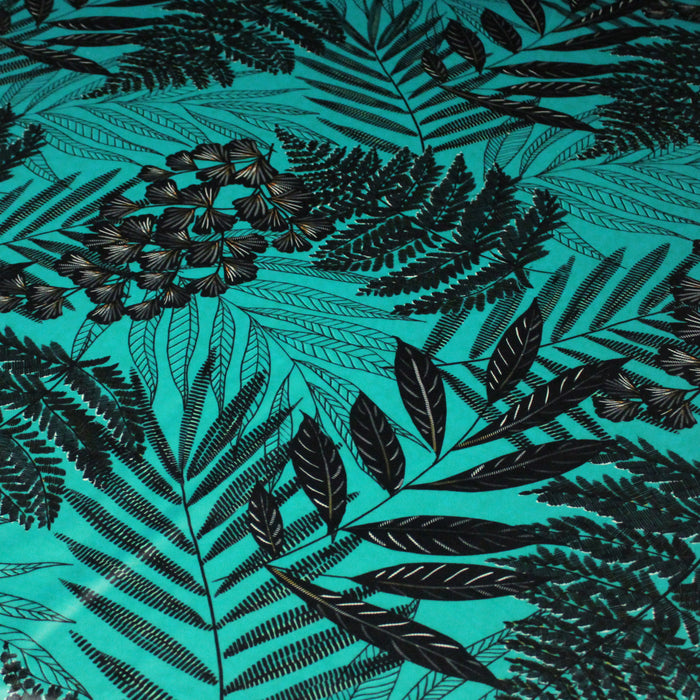 Tissu Velours ras motif tropical, tons vert émeraude et noirs