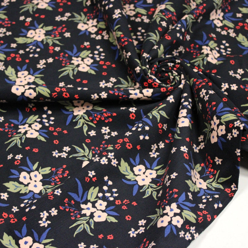 Tissu velours milleraies imprimé noir aux fleurs écrues, bleues, vertes - STANDARD 100 OEKO-TEX - TissusPapi.com