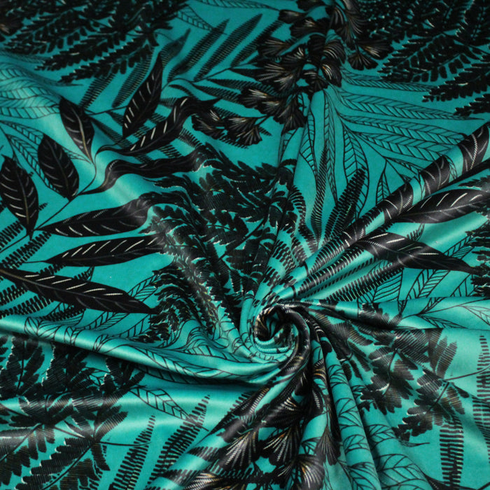 Tissu Velours ras motif tropical, tons vert émeraude et noirs