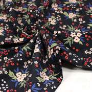 Tissu velours milleraies imprimé noir aux fleurs écrues, bleues, vertes - STANDARD 100 OEKO-TEX - TissusPapi.com