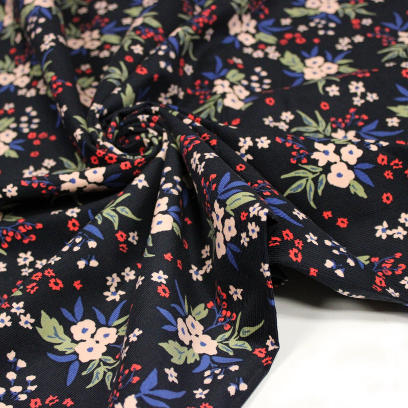 Tissu velours milleraies imprimé noir aux fleurs écrues, bleues, vertes - STANDARD 100 OEKO-TEX - TissusPapi.com