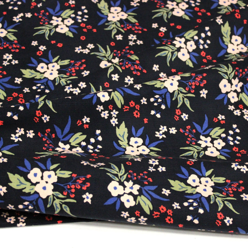 Tissu velours milleraies imprimé noir aux fleurs écrues, bleues, vertes - STANDARD 100 OEKO-TEX - TissusPapi.com