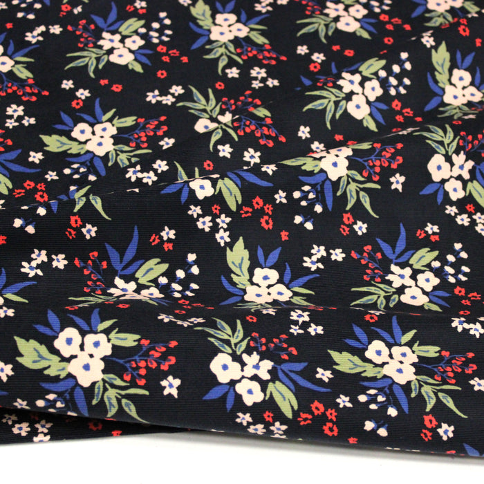 Tissu velours milleraies imprimé noir aux fleurs écrues, bleues, vertes - STANDARD 100 OEKO-TEX