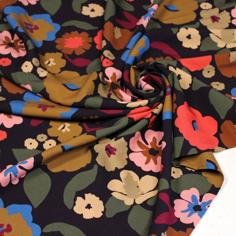 Tissu Viscose fluide fleurs graphiques rétro multicolores, fond noir – STANDARD 100 OEKO-TEX - TissusPapi.com