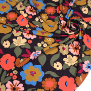 Tissu Viscose fluide fleurs graphiques rétro multicolores, fond noir – STANDARD 100 OEKO-TEX - TissusPapi.com