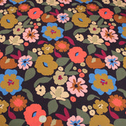 Tissu Viscose fluide fleurs graphiques rétro multicolores, fond noir – STANDARD 100 OEKO-TEX - TissusPapi.com