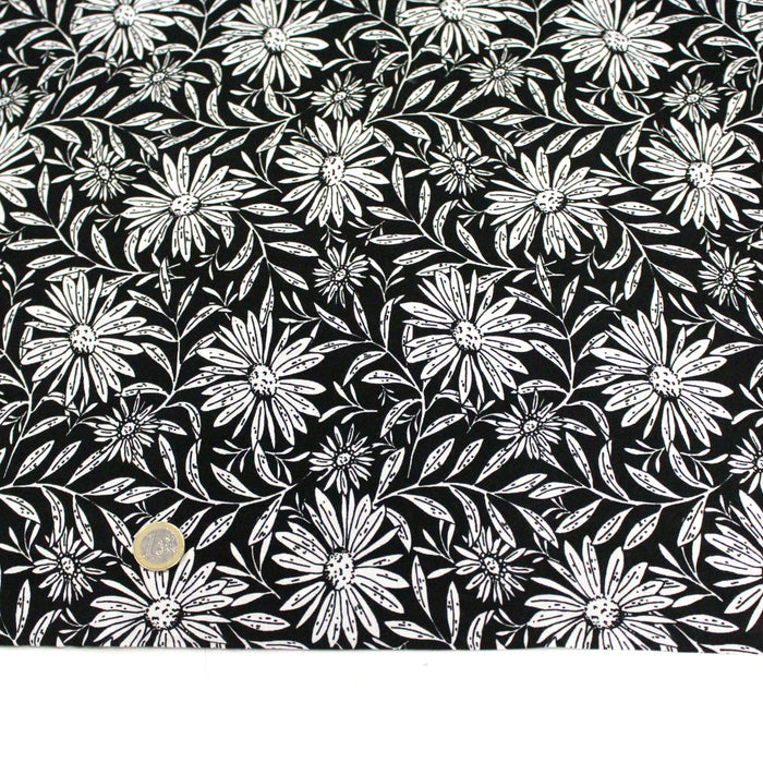 Tissu viscose fluide fond noir aux grandes fleurs blanches - OEKO-TEX®