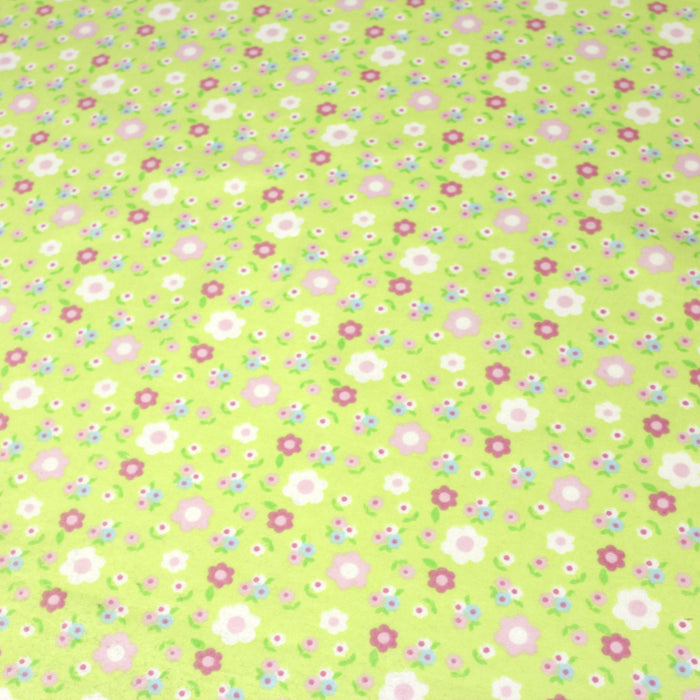 Tissu de coton gratté vert aux fines fleurs roses et blanches