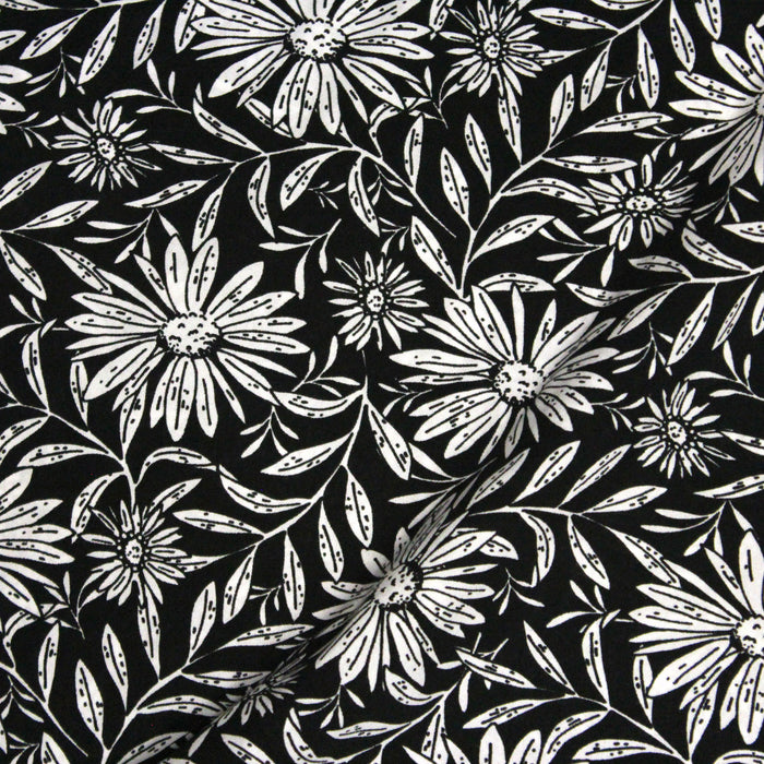 Tissu viscose fluide fond noir aux grandes fleurs blanches - OEKO-TEX®
