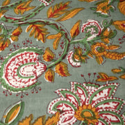 Tissu coton fin imprimé INDIENNES, vert amande aux fleurs jaunes rouges et blanches - TissusPapi.com