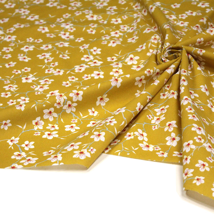 Tissu coton jaune moutarde aux fleurs d'amandier - OEKO-TEX