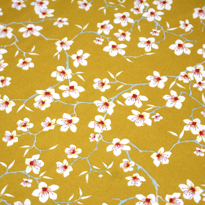 Tissu coton jaune moutarde aux fleurs d'amandier - OEKO-TEX