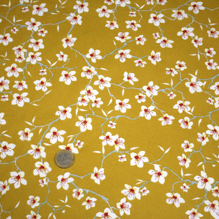 Tissu coton jaune moutarde aux fleurs d'amandier - OEKO-TEX