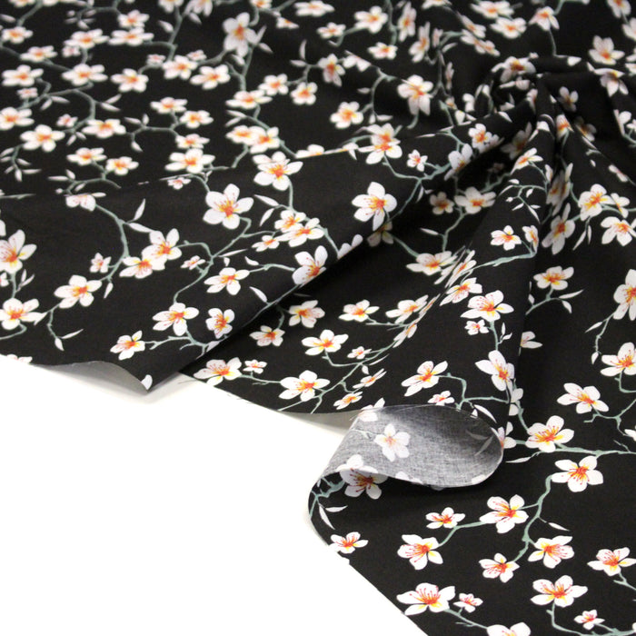 Tissu coton noir aux fleurs d'amandier - OEKO-TEX